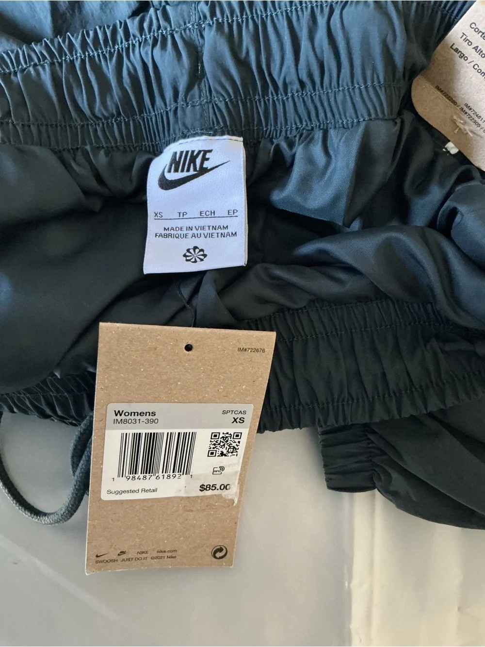 Nike women’s black track pants athletic windbreaker white stripe XS